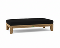 Riviera daybed with black cushions on white background.  