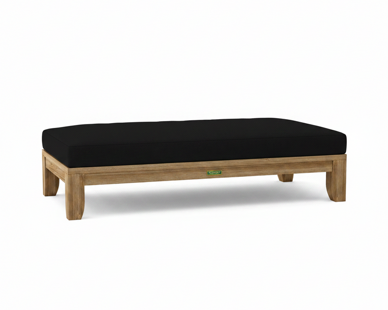 Riviera daybed with black cushions on white background.  
