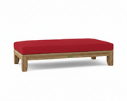 Riviera daybed with jockey red cushions on white background.  
