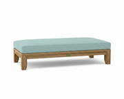 Riviera daybed with mineral blue cushions on white background.  