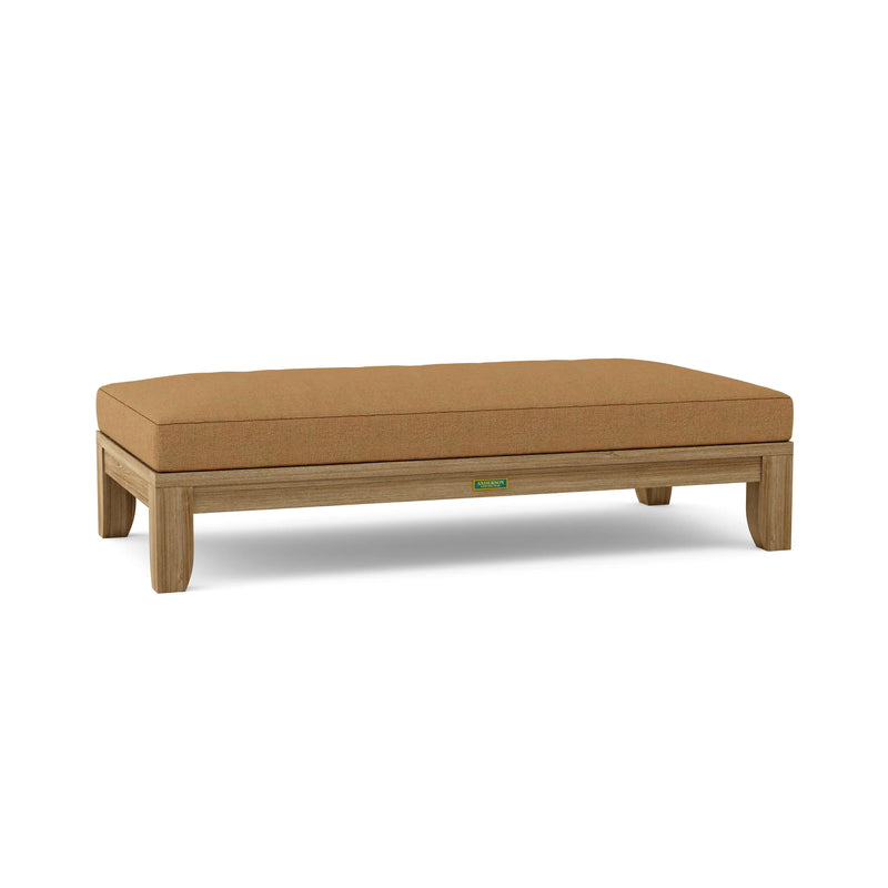 Riviera daybed with teak cushions on white background.  