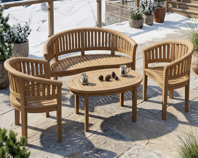 Anderson Teak Outdoor Living Set on a stone patio in the winter.  