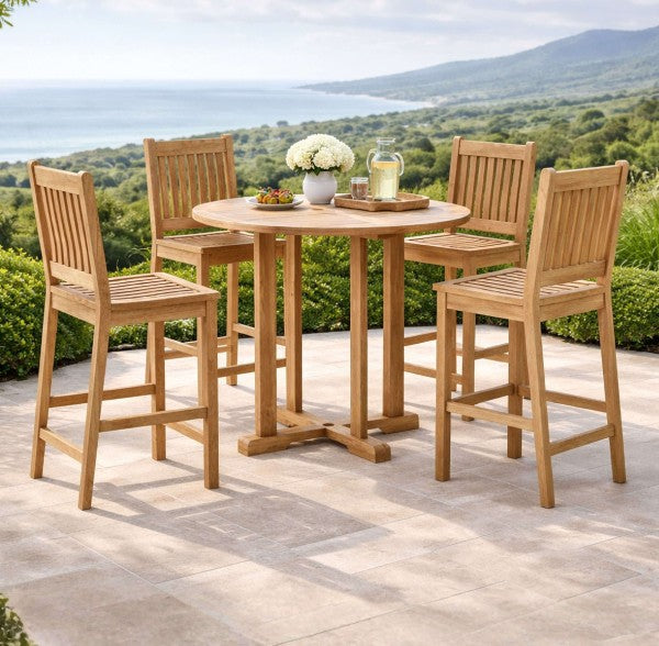 Anderson Teak Bahama Avalon 5-Piece Round Bar Set on a stone patio with ocean views.  