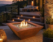 HPC Sierra 36-inch smooth copper fire bowl on a wooden patio with mountain views.  