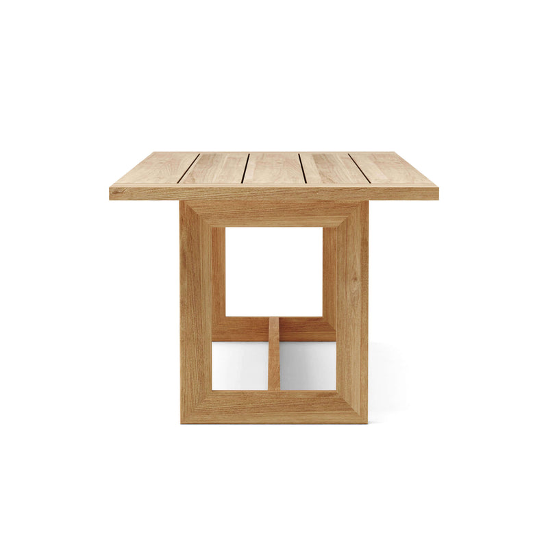Anderson Teak Smyrna dining table - end view on white background.  
