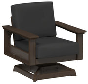 Brown armchair with dark cushions on a white background