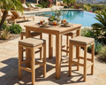Anderson Teak 35" square bistro table with 4 stools positioned near a pool with can yon views.  
