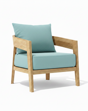Toscana teak lounge chair with mineral blue cushion on white background. 