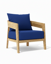 Toscana teak lounge chair with true blue cushion on white background. 