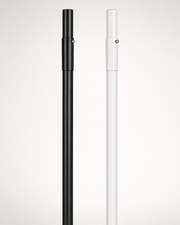 Black and white umbrella poles on a light gray background