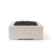 Alea 32-inch clay concrete fire pit with black lava rock on a white background.  