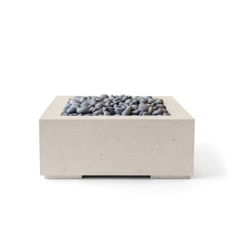 Alea 32-inch firepit in clay with slate beach stones on a white background.  