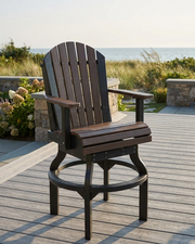 Adirondack chair on a deck with a scenic background