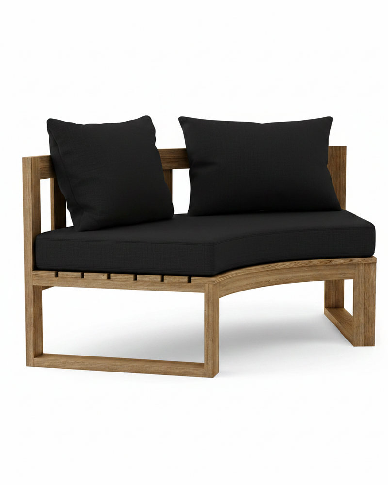 Circular teak bench with black cushions on white background.  