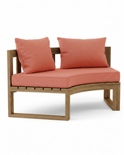 Circular teak bench with henna cushions on a white background.  