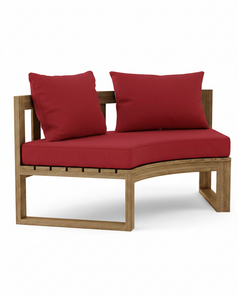 Circular teak bench with jockey red cushions on a white background. 