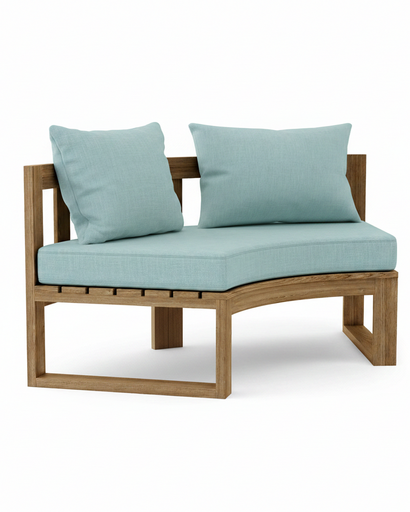 Cicular teak bench with mineral blue cushions on a white background.  