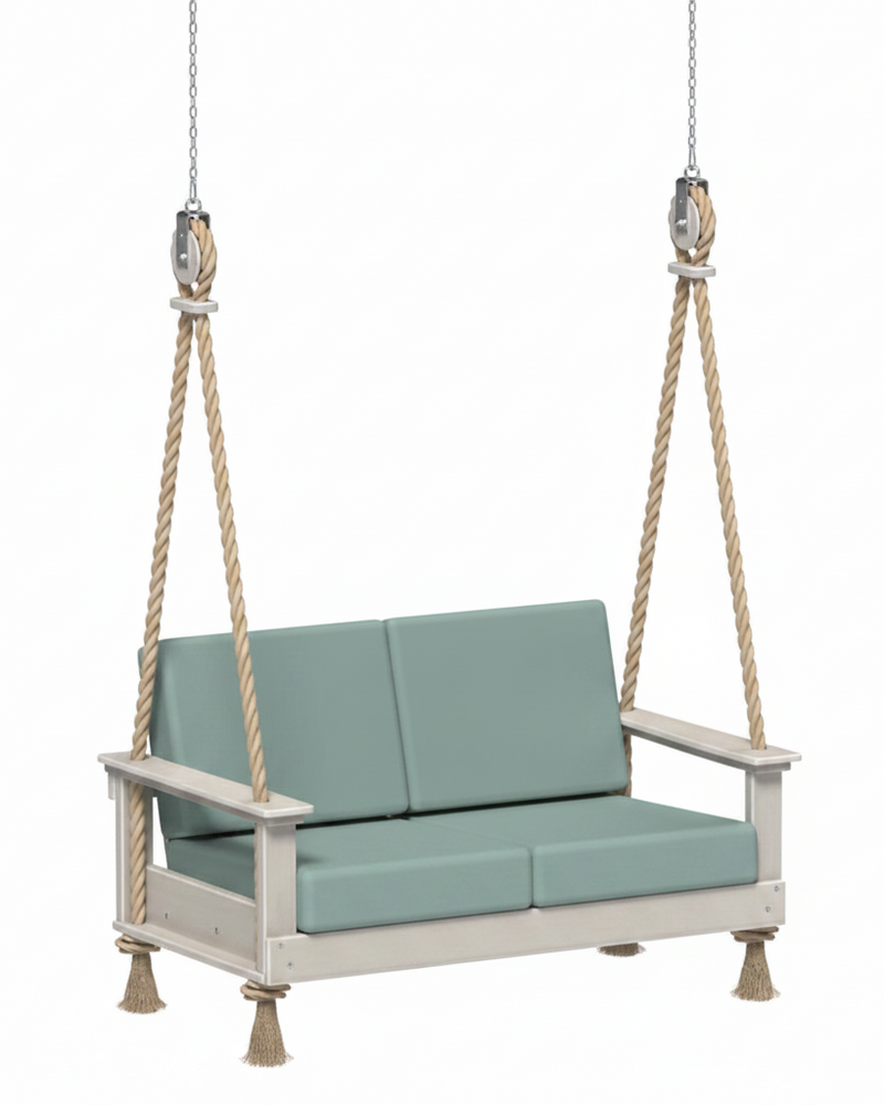 Two-seater swing with green cushions and white frame on a white background