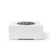 Bravo lightweight natural concrete fire pit with slate beach stones on a white background.