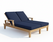 Navy blue cushioned lounge chair with wooden frame on a white background