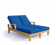 Wooden lounge chair with blue cushions on a white background