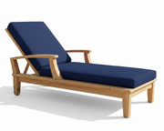 Wooden lounge chair with navy cushions on a white background