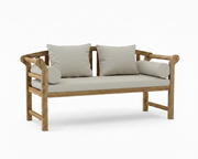 A wooden outdoor bench with a natural oak finish, featuring a light beige seat cushion, two matching back cushions, and two cylindrical bolster pillows, shown on a clean white background.