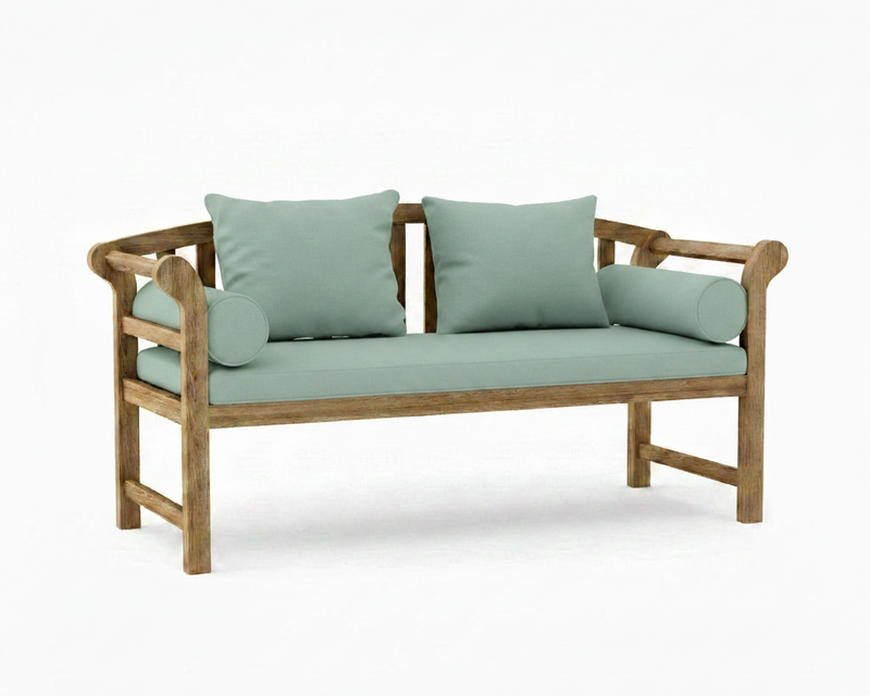 A wooden outdoor loveseat with a natural wood frame and sage green cushions, including two back cushions and two cylindrical bolsters, shown on a white background.
