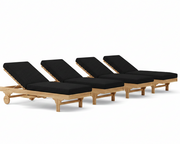 Four wooden lounge chairs with black cushions on a white background