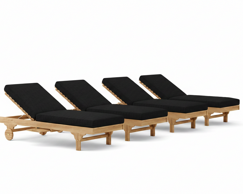 Four wooden lounge chairs with black cushions on a white background