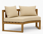 Circular teak bench with antique beige cushions on a white background.