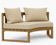 Circular teak bench with dupione sand cushions on a white background. 