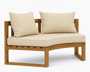 Circular teak bench with linen canvas cushions on a white background.  