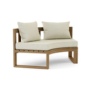 Circular teak bench with natural cushions on a white background.  
