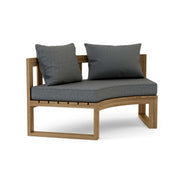 Circular teak bench with cast charcoal cushions on a white background.  