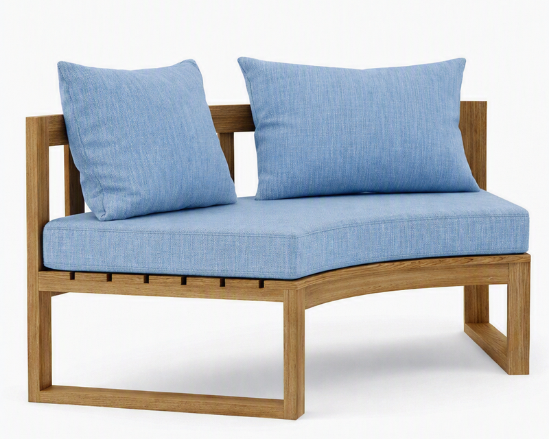 Circular teak bench with cast ocean cushions on a white background.  