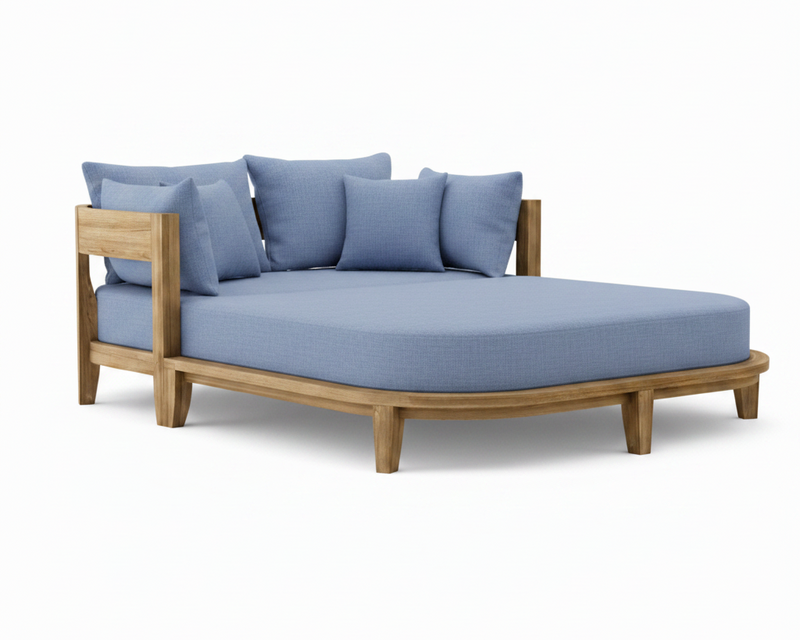 Coronado teak day bed with cast ocean cushion on white background.