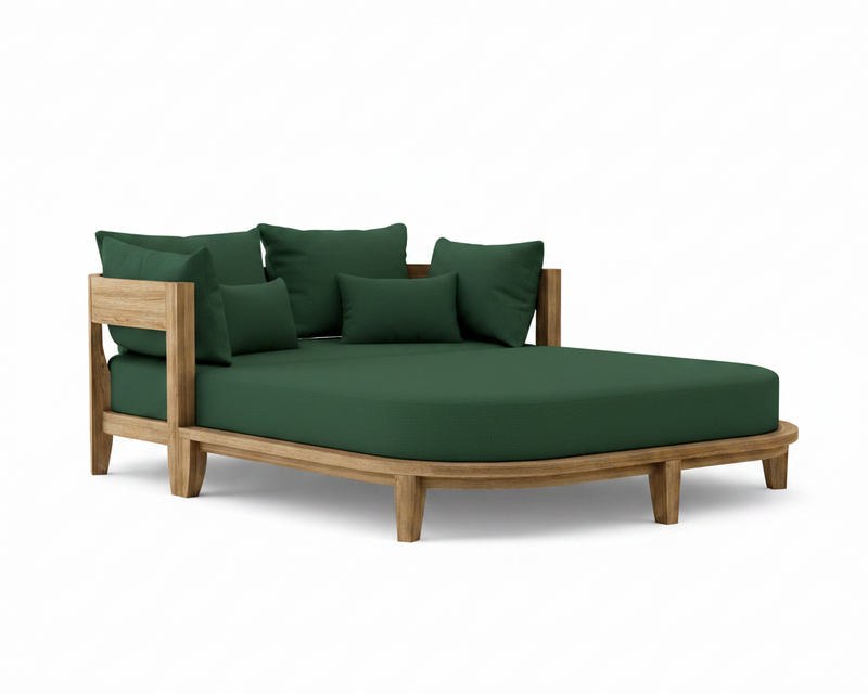 Coronado teak day bed with forest green cushion on white background.