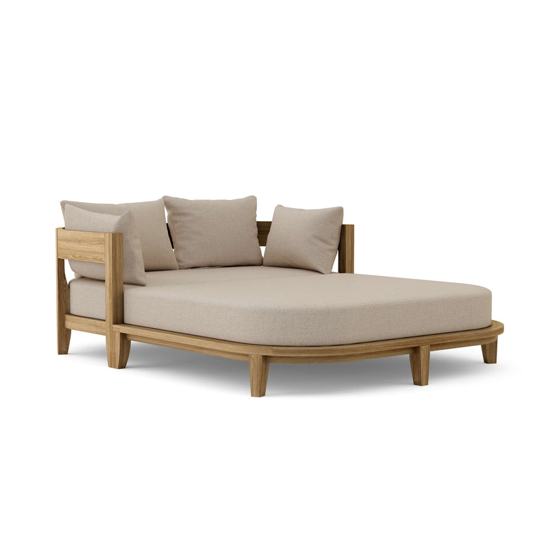 Coronado teak day bed with cast ash cushion on white background.