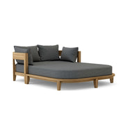 Coronado teak day bed with cast charcoal cushion on white background.