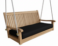Wooden swing with black cushion on a white background