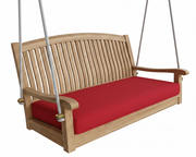 Wooden swing with red cushion on a white background