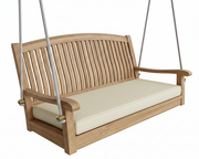 Wooden porch swing with white cushion on a white background