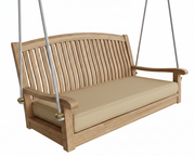 Wooden porch swing with beige cushion on a white background