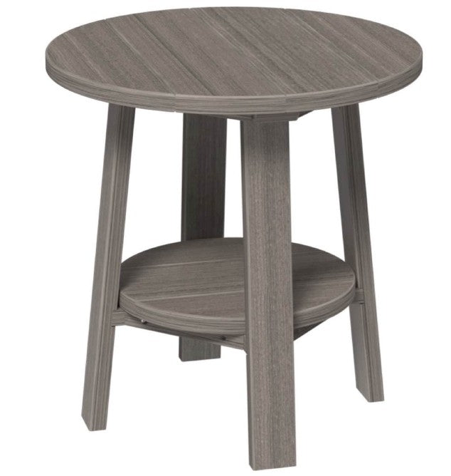 Round side table with a gray finish on a white background