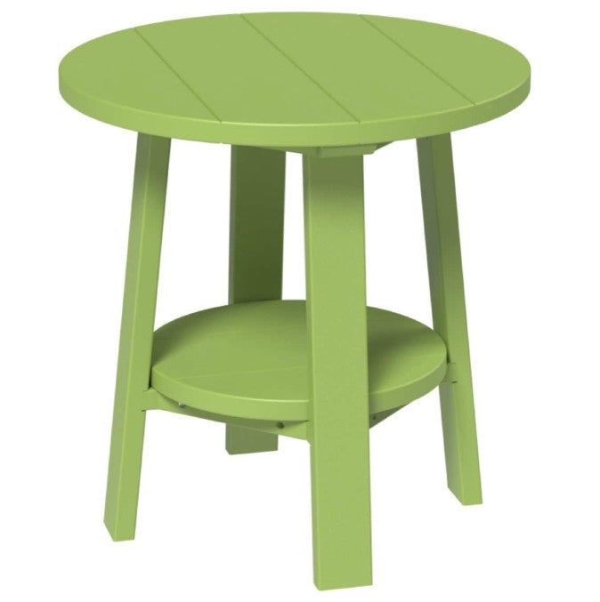 Green round side table on a white background