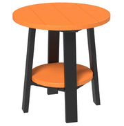 Small round table with orange top and black legs on a white background