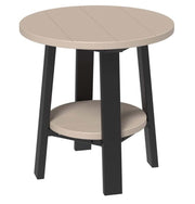 Round table with beige top and black legs on a white background