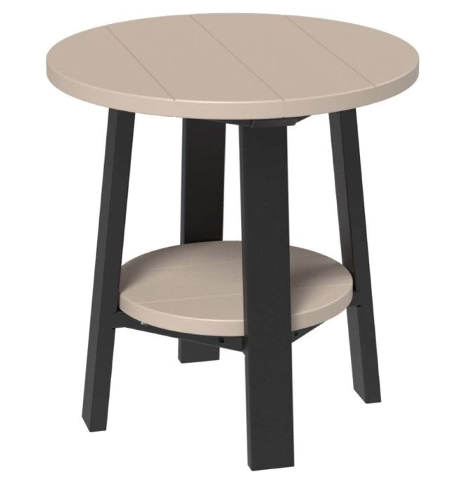 Round table with beige top and black legs on a white background
