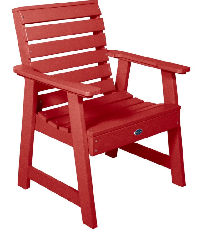 Red chair with armrests on a white background